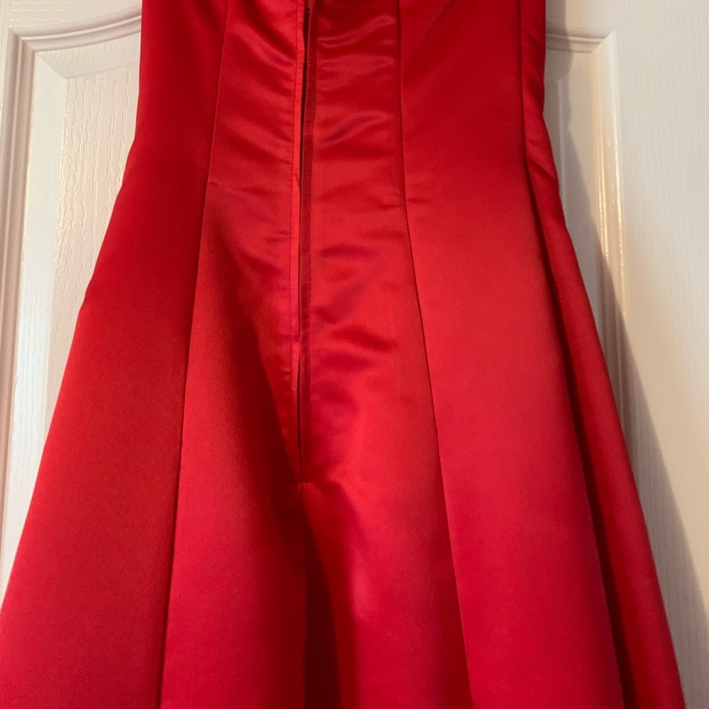 Red strapless princess like gown